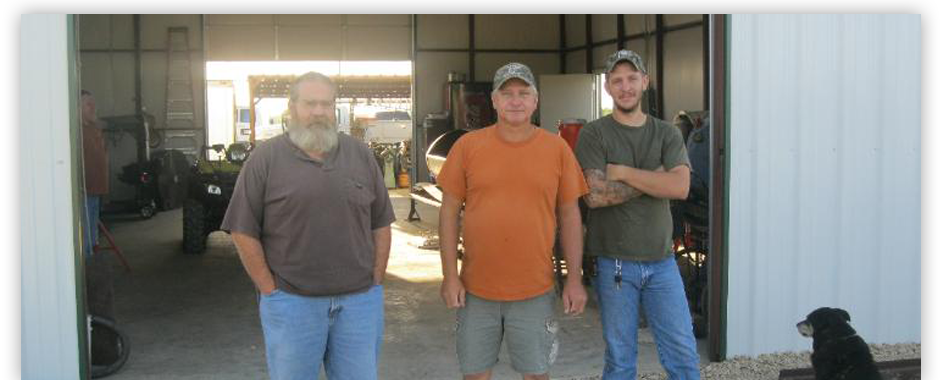 Page Boiler service team standing in front of company trucks